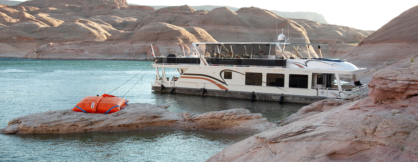 Anchoring Houseboat on Lake Powell with Beach Bags